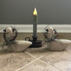 Primitive candle and ducks